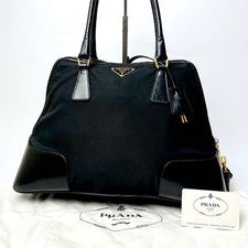 In recent years, Prada triangular logo handbags have been available in n #QY42UF