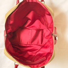 Prada canvas handbag with red leather trim, Boston bag in beige. #QY6H8A