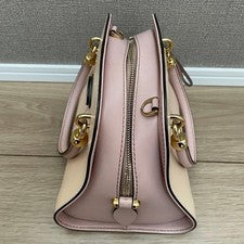 Tod's Sera 2-way handbag/shoulder bag for women, two-tone. #QYDBLT