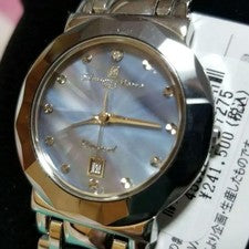 An elegant quartz wristwatch with a mother-of-pearl dial and stone indic #QY7IUQ
