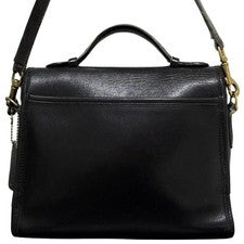 Old Coach 2-way leather shoulder bag, black, with turn-lock closure. #QYJANO
