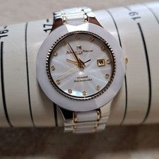Highly impressive white shell and 12 diamonds included. #QY7QKE