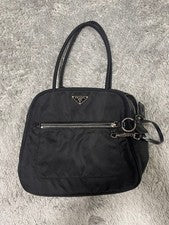 Classic Prada tote bag with triangular logo plate, nylon x leather. #QY3OM8