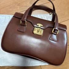 Gucci brown leather handbag with case #QY9WL3